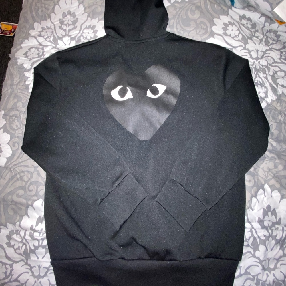 hoodie is large but it runs small. i wear a small and medium